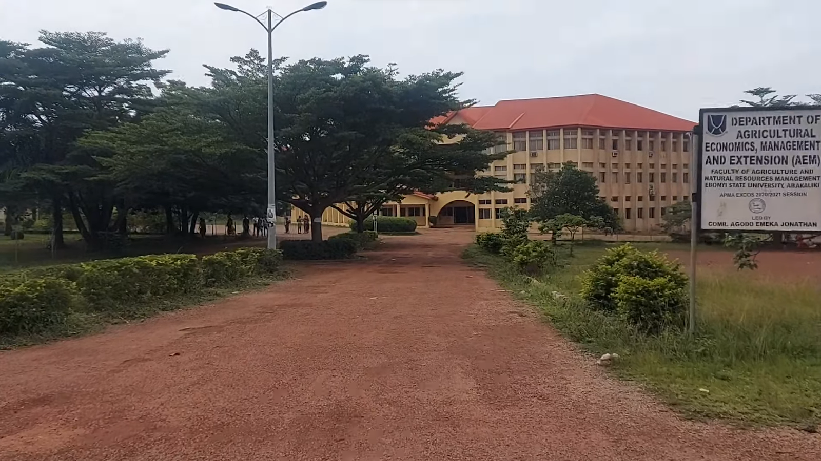 A serene view of a university's department building and its surroundings
