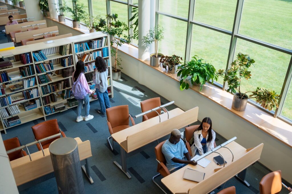 High angle of students learning in library